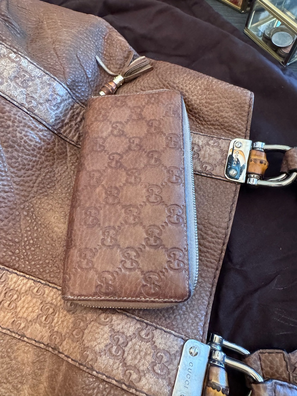Gucci Brown GG Embossed Zip Wallet